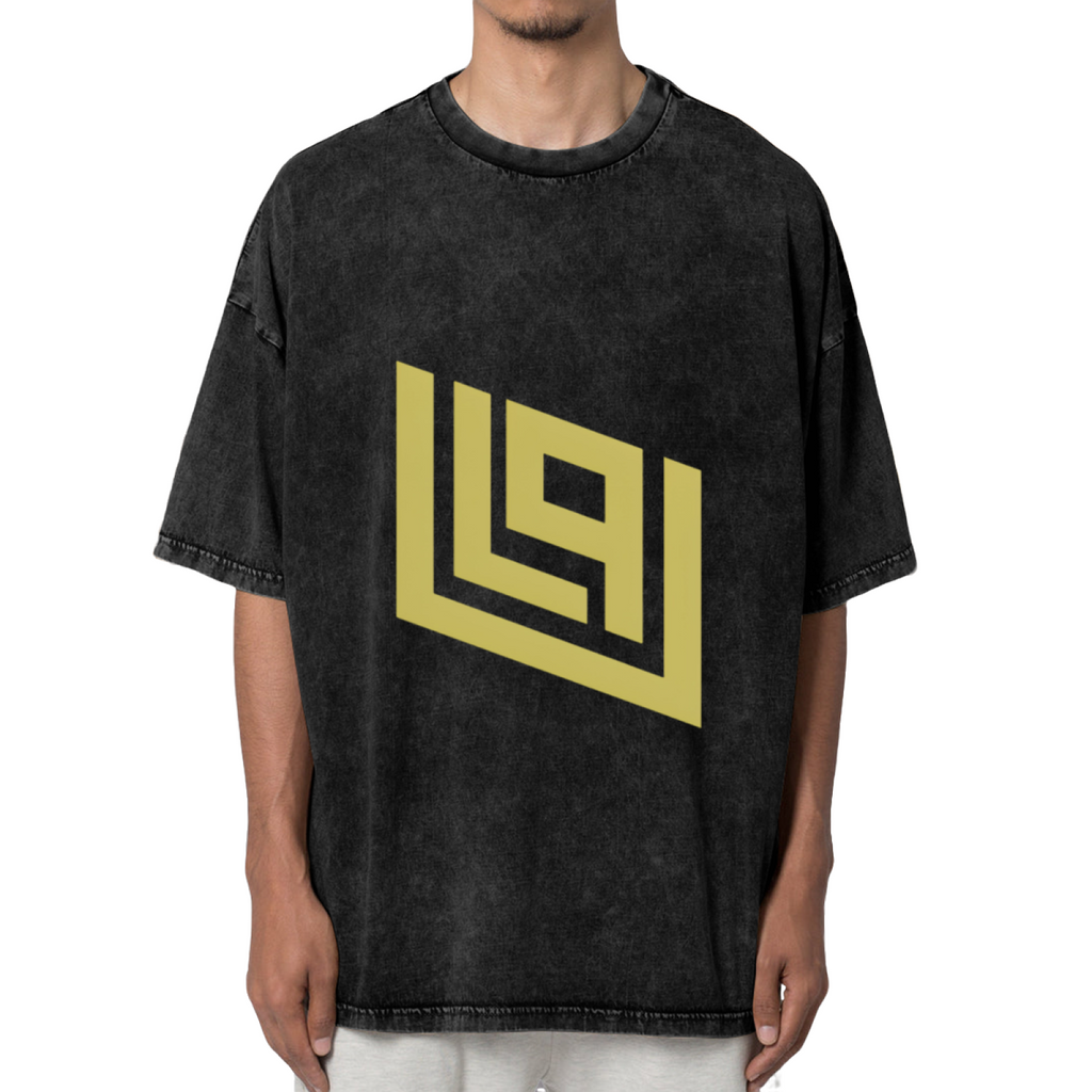 Front view of a dark washed graphic T-shirt featuring gold angular geometric emblem