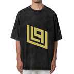 Front view of a dark washed graphic T-shirt featuring gold angular geometric emblem