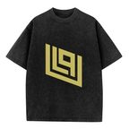 Product image of a washed graphic T-shirt featuring gold angular geometric emblem
