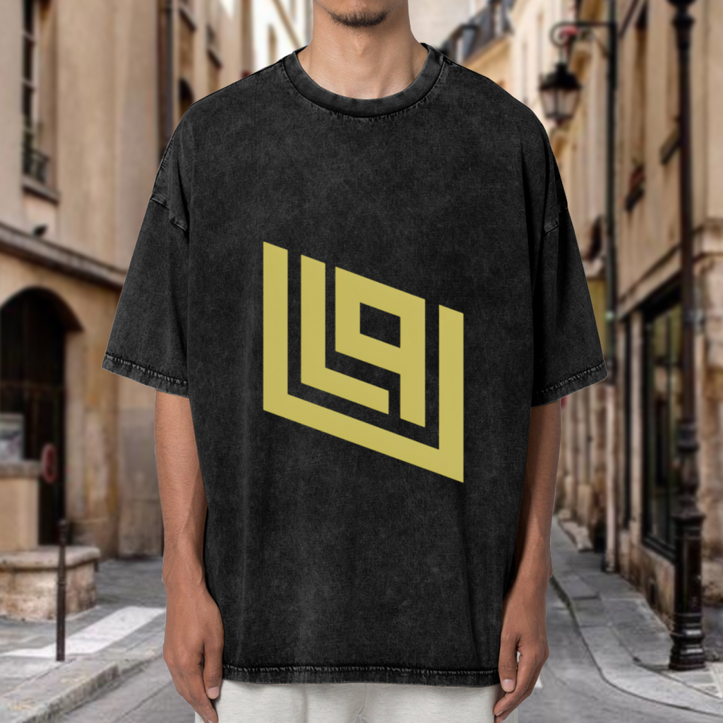 Product image of a washed graphic T-shirt featuring gold angular geometric emblem