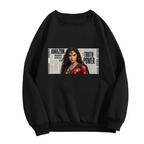 A determined warrior portrait over large newspaper-style lettering shown on the front of a men's crewneck sweatshirt in a standalone product shot