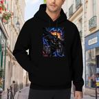 On-location model photograph displaying a winged masked figure leaping amid electric bolts on the front of a men's hoodie