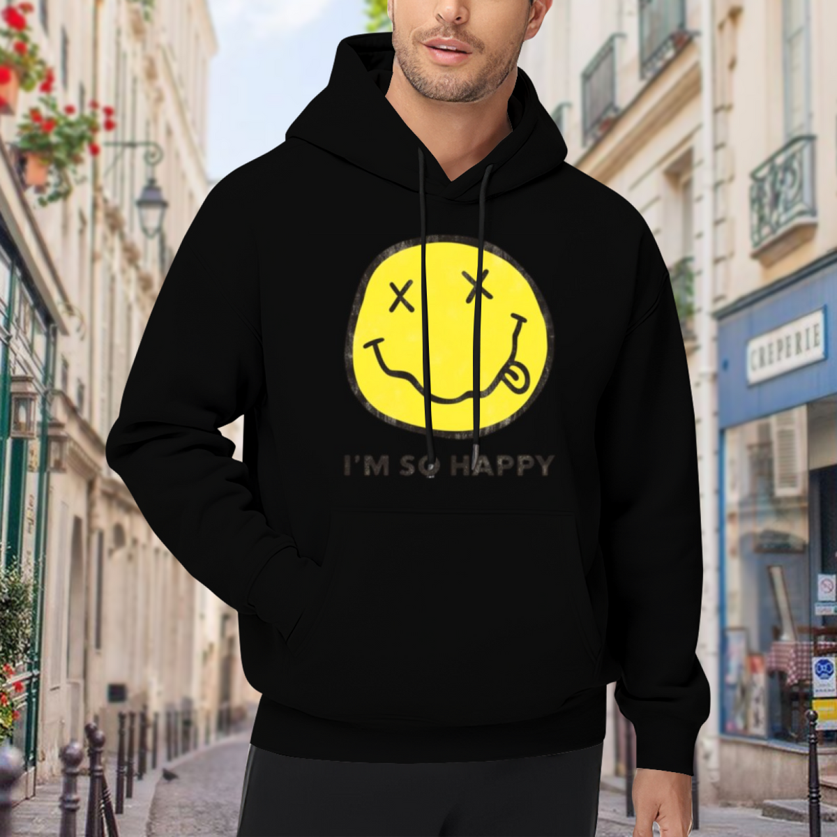 Nirvana Im So Happy Yellow Smiley Hoodie, product listing image of the a playful text-and-symbol design graphic