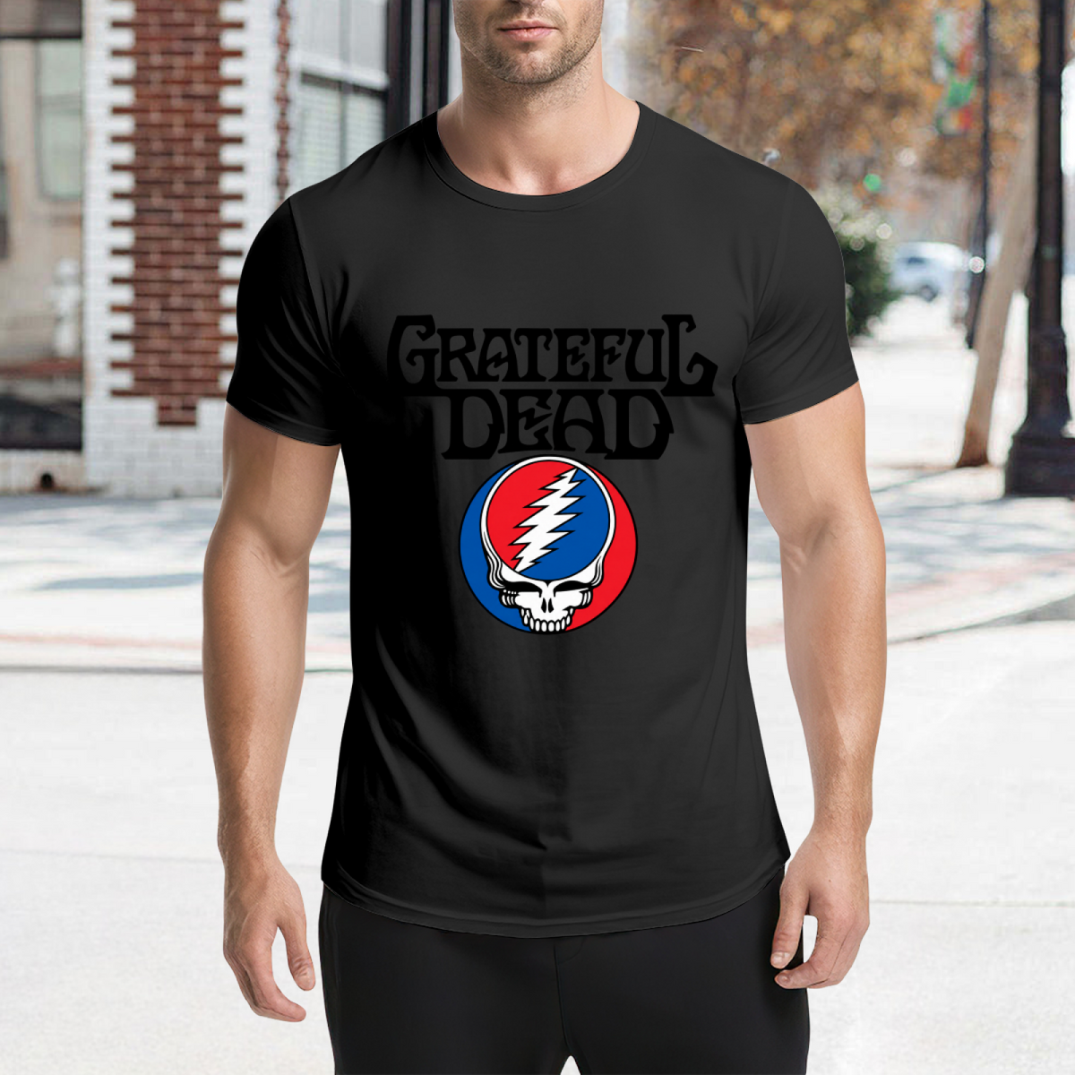 Graphic detail of Grateful Dead Steal Your Face skull logo graphic T-shirt on a black T-shirt