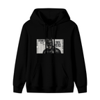 Front garment photograph: women's hoodie decorated with a monochrome cowl portrait layered over a newspaper-style panel