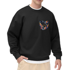Men's crewneck sweatshirt seen on a model, its front graphic depicting a winged masked figure bursting through jagged multicolored paint strokes