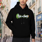 Outdoor photograph of a model in a men's hoodie bearing two cartoon figures beside stylized lettering and a green portal