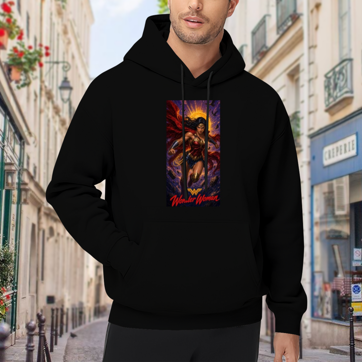 Outdoor photograph of a model in a men's hoodie bearing a lasso-wielding warrior posed before a radiant sun halo