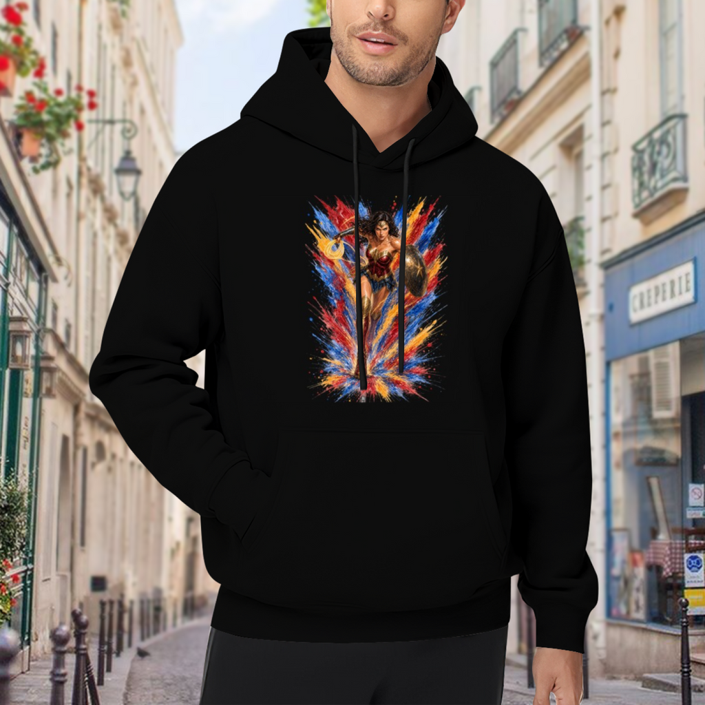 Outdoor photograph of a model in a men's hoodie bearing a shield-bearing warrior with a lasso amid jagged multicolored paint strokes