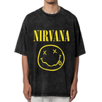 Nirvana Classic Smiley Logo Washed Tee in Black, product image showing the classic yellow Nirvana smiley-face logo in a grunge-inspired layout.