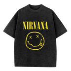 Nirvana Classic Smiley Logo Washed Tee in Black, product image showing the classic yellow Nirvana smiley-face logo in a grunge-inspired layout.