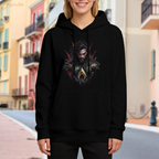On-location model photograph displaying a centered bearded warrior portrait with red eyes and rough dark edges on the front of a women's hoodie