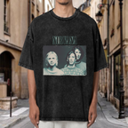 Nirvana Blue Gray Band Photo Washed Tee in Black, product image showing a three-member Nirvana portrait in a blue-gray photographic treatment.