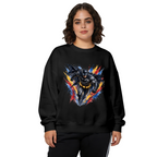 Studio photograph of a model in a women's crewneck sweatshirt showing a winged masked figure bursting through jagged multicolored paint strokes