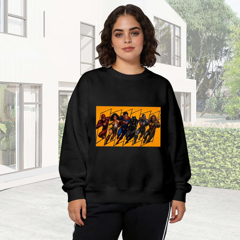 On-location model photograph displaying a group of costumed figures charging across a warm-toned action panel on the front of a women's crewneck sweatshirt