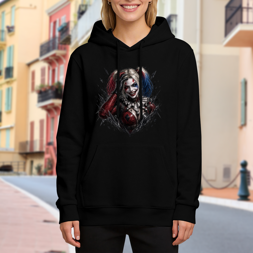 Outdoor photograph of a model in a women's hoodie bearing a pigtail portrait with a sly smile and rough-edged details