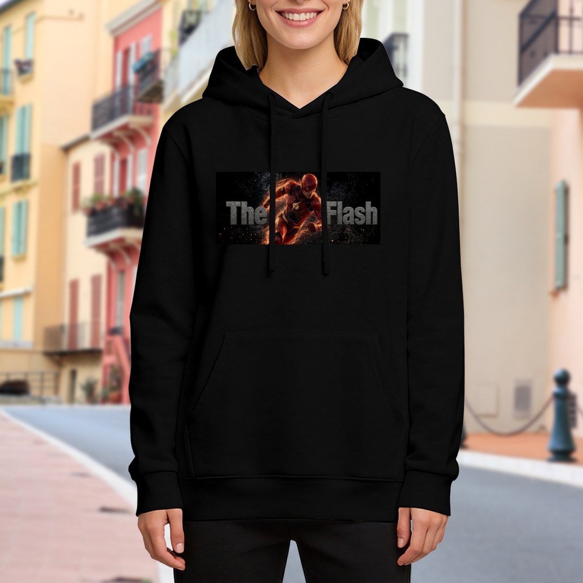 A running masked figure centered in a narrow lettered banner visible on a women's hoodie in an outdoor front model view