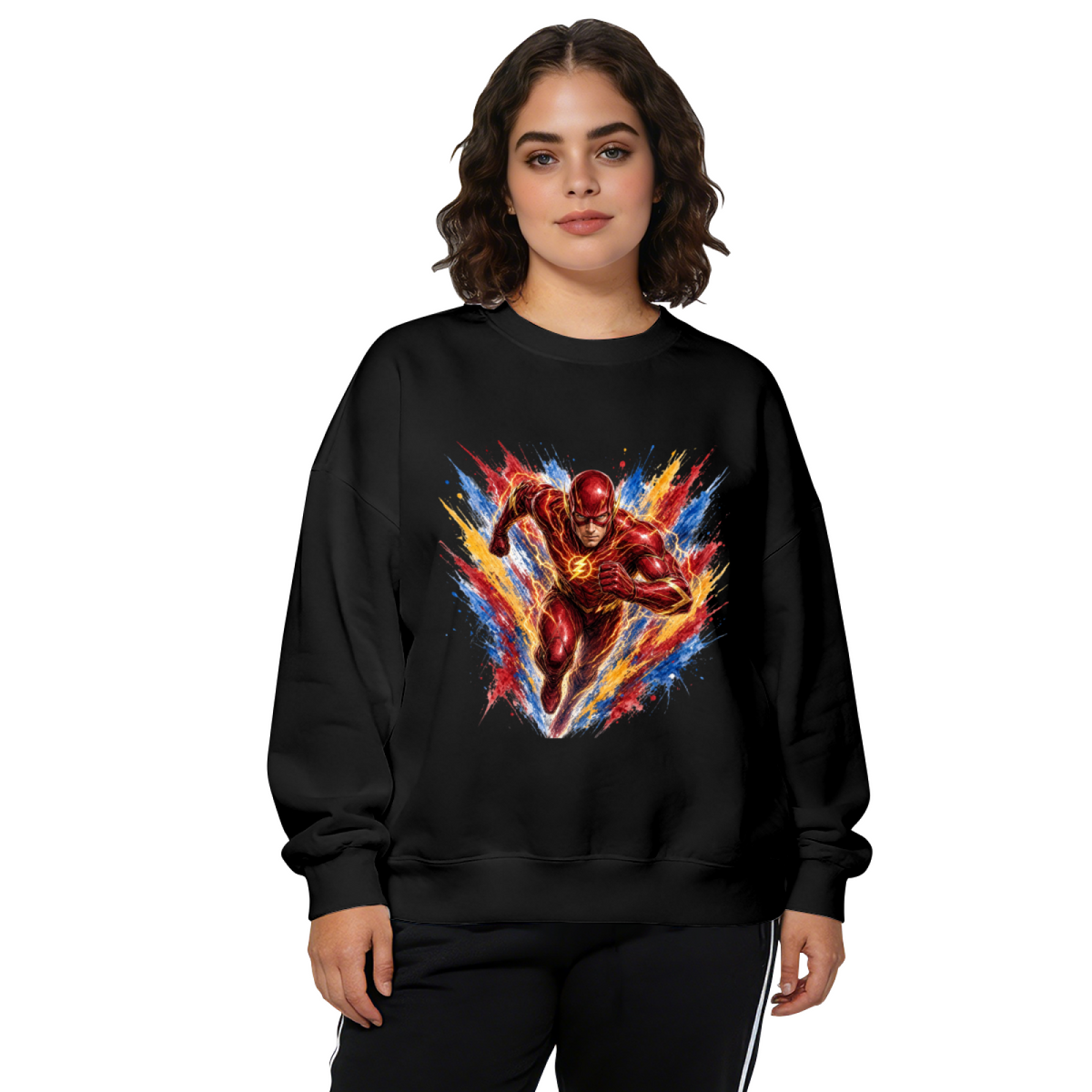 Studio photograph of a model in a women's crewneck sweatshirt showing a masked runner moving through an explosion of multicolored brushstrokes