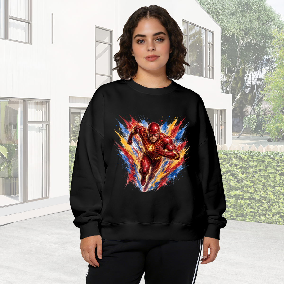 Women's crewneck sweatshirt worn outside, with the camera facing the graphic of a masked runner moving through an explosion of multicolored brushstrokes