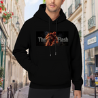 Outdoor photograph of a model in a men's hoodie bearing a running masked figure centered in a narrow lettered banner