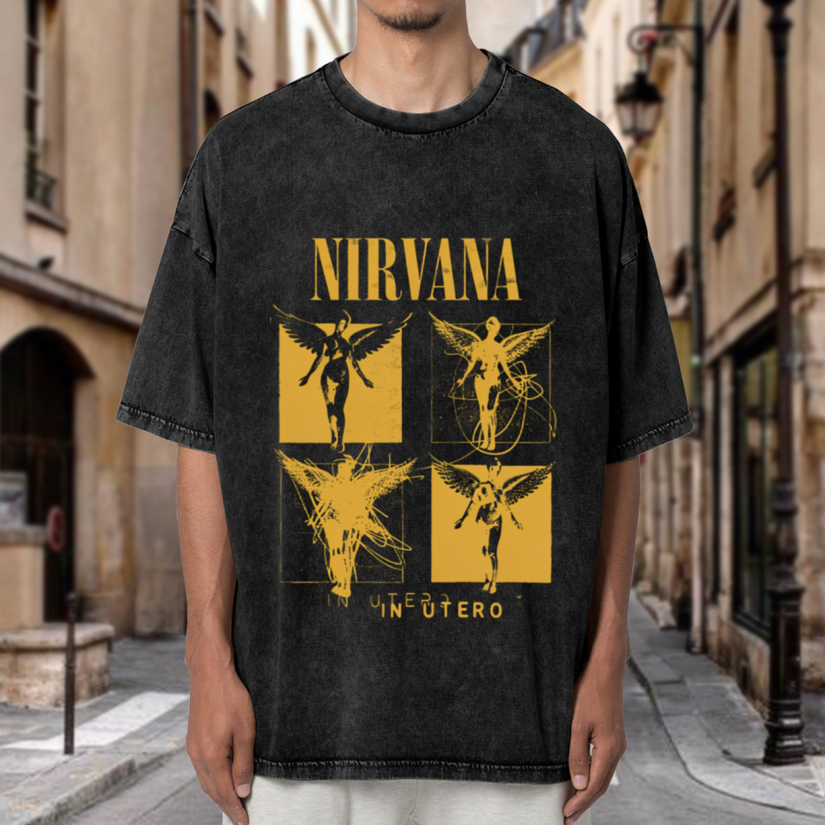 Nirvana In Utero Four Panel Washed Tee in Black, product image showing four yellow-toned panels featuring angel-related In Utero artwork.