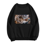 A trident-bearing cat surrounded by surging waves in a sea battle shown on the front of a men's crewneck sweatshirt in a standalone product shot
