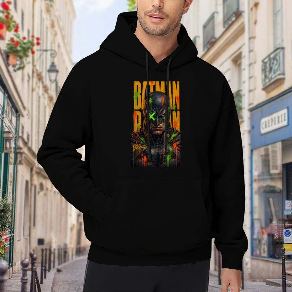 Men's hoodie worn outside, with the camera facing the graphic of a tall graffiti-style cowl portrait with a green X across the eyes