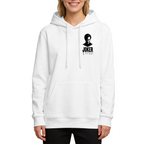 Studio photograph of a model in a women's hoodie showing a small clown silhouette and ink-style lettering