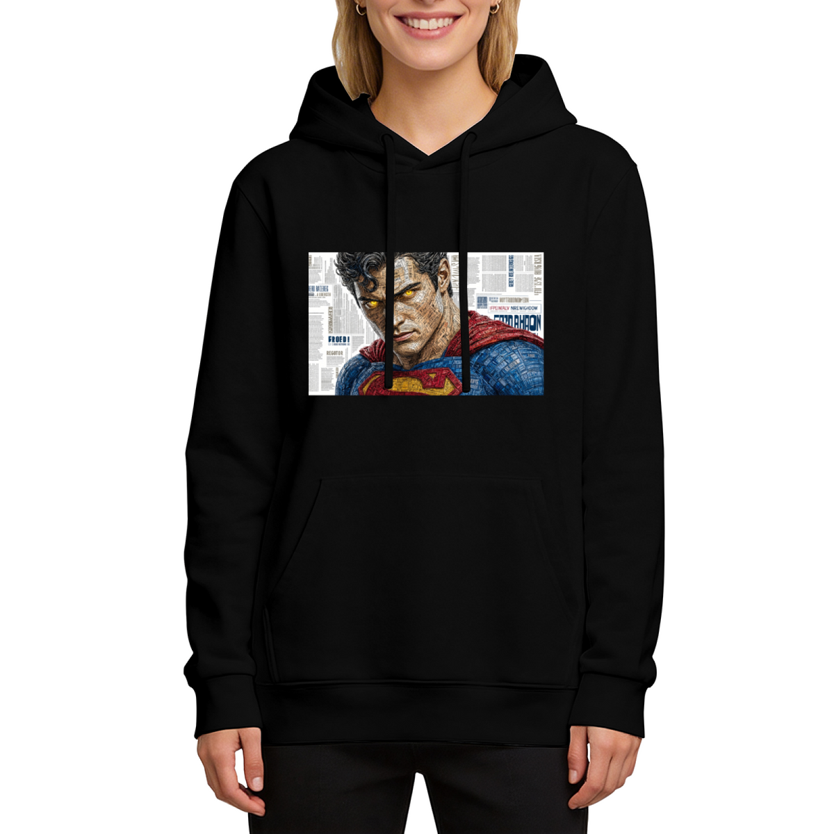 On-model product photo: women's hoodie bearing a tightly cropped intense face above a cape against newsprint