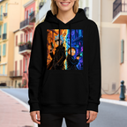 Women's hoodie worn outside, with the camera facing the graphic of two travelers between contrasting warm and cool city scenes