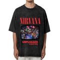 Nirvana MTV Unplugged New York Washed Tee in Black, product image showing nirvana’s MTV Unplugged in New York stage photograph framed by album-inspired lettering.