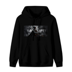 Men's hoodie photographed alone, with an armored figure in a smoky grayscale panel with lettering on the front