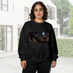 Women's crewneck sweatshirt worn outside, with the camera facing the graphic of animal figures gathered around a banquet table in a candlelit Gothic hall
