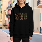 On-location model photograph displaying a shield-bearing cat confronting a large monster in a fantasy scene on the front of a women's hoodie