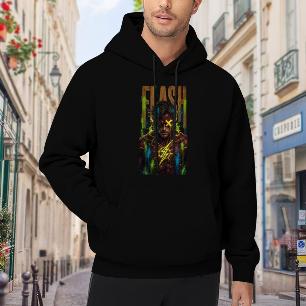 Outdoor photograph of a model in a men's hoodie bearing a masked graffiti portrait with a yellow X and lightning marks