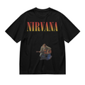 Nirvana Kurt Cobain Acoustic Guitar Graphic T-Shirt — product design preview of the artwork; kurt Cobain is shown with an acoustic guitar in a performance photograph