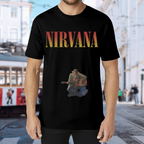 Nirvana Kurt Cobain Acoustic Guitar Graphic T-Shirt — product design preview of the artwork; kurt Cobain is shown with an acoustic guitar in a performance photograph