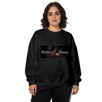 Studio photograph of a model in a women's crewneck sweatshirt showing a warrior with crossed armored bracers in a lettered chest banner