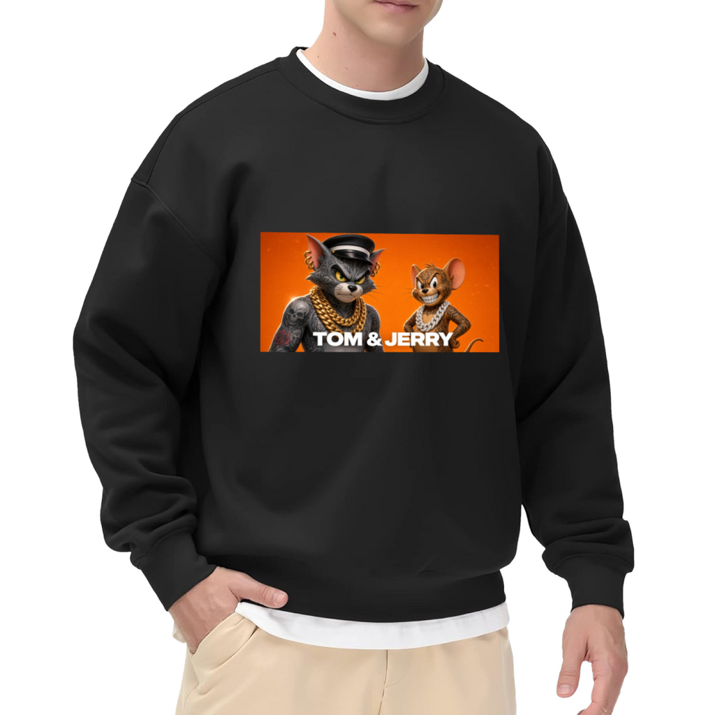 Front-facing model wearing a men's crewneck sweatshirt decorated with a cartoon cat and mouse wearing gold chains in a portrait panel