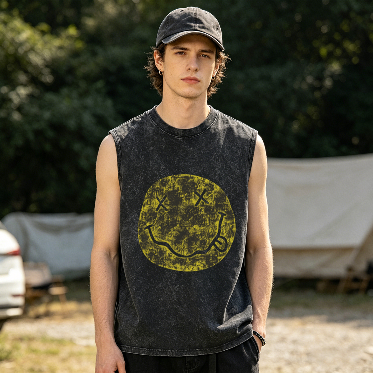 Nirvana Distressed Smiley Face Washed Tank Top — product image showing the a distressed-style Nirvana smiley-face emblem design