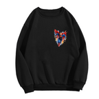 Unworn men's crewneck sweatshirt, front view of the design depicting a flying caped figure amid sharp multicolored brushstrokes