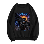Front garment photograph: women's crewneck sweatshirt decorated with a winged masked figure leaping amid electric bolts