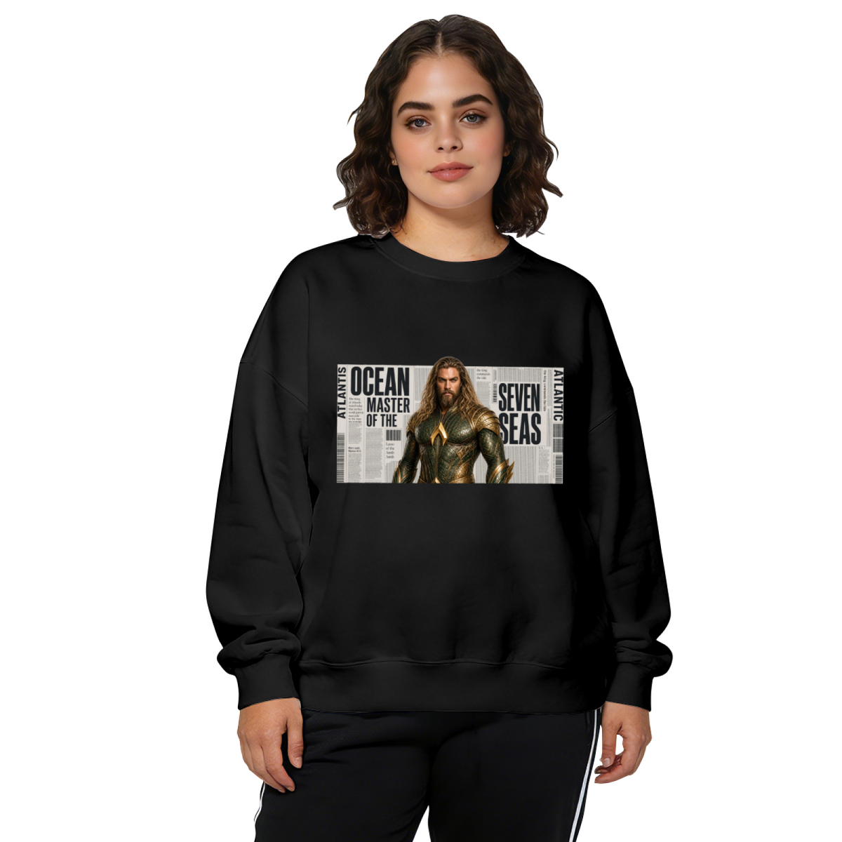 Studio photograph of a model in a women's crewneck sweatshirt showing a long-haired ocean warrior in armor against newspaper-style lettering