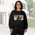 Women's crewneck sweatshirt worn outside, with the camera facing the graphic of a long-haired ocean warrior in armor against newspaper-style lettering