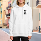 Lifestyle image outdoors: women's hoodie with a front graphic of a compact pigtail silhouette with ink-style lettering
