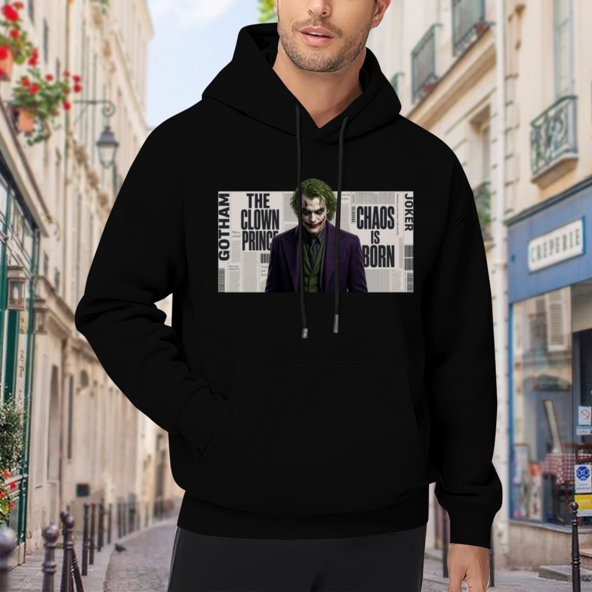 Men's hoodie worn outside, with the camera facing the graphic of a suited clown portrait against a newspaper-style text collage