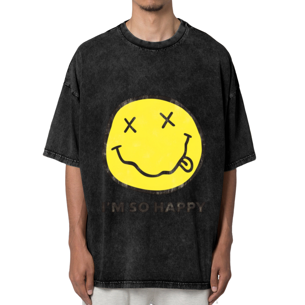 Nirvana Smiley Face Yellow Washed Tee in Black, product image showing a yellow smiley-face print associated with Nirvana and the words I’m So Happy.