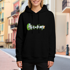 Two cartoon figures beside stylized lettering and a green portal visible on a women's hoodie in an outdoor front model view
