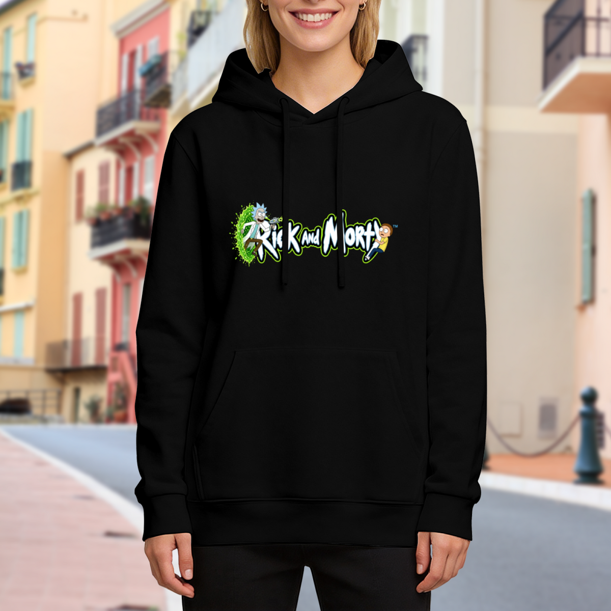 Two cartoon figures beside stylized lettering and a green portal visible on a women's hoodie in an outdoor front model view