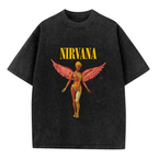 Nirvana In Utero Pink Angel Washed Tee in Black, product image showing a pink winged angel illustration based on the In Utero visual theme.